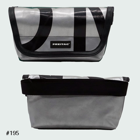 FREITAG F40 Jamie hip bag in grey with black graphic print, upcycled truck tarp belt bag, front and back views.