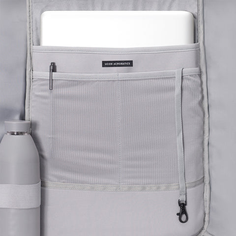 Interior view of Hajo Mini Backpack Lotus Series with a laptop compartment with two mesh pockets,  bottle holder and key strap
