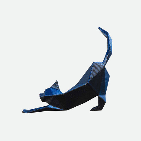 Maison203 Cat Brooch Ocean, a 3D-printed geometric cat design in black and blue hues, shown mid-stretch on a plain background