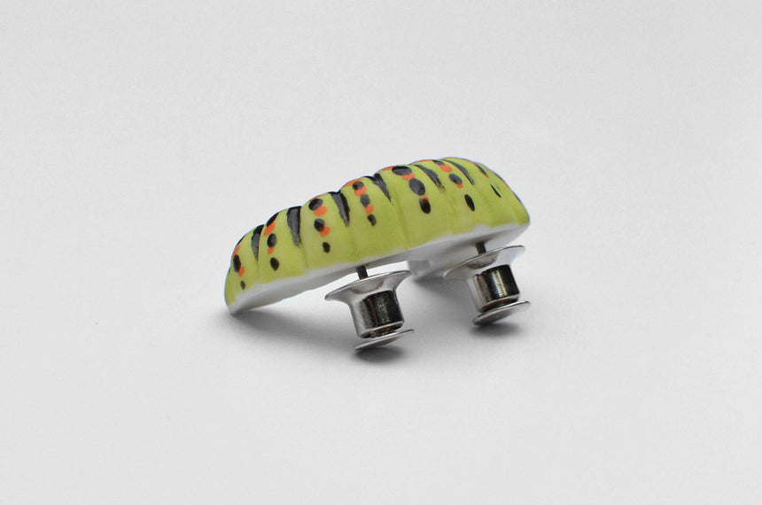 Pin Caterpillar Red Dot Design Museum Singapore